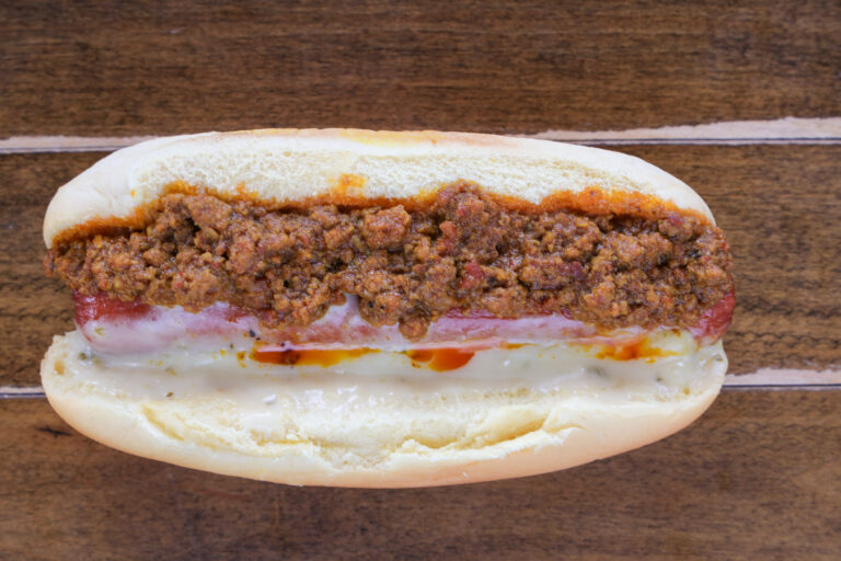 Chili cheese hot dog with queso a soft bun